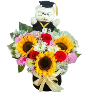 Flores surtidas en caja con peluche