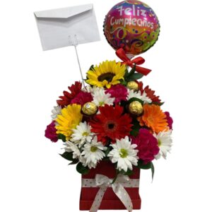 Flores tropicales, chocolates y globo